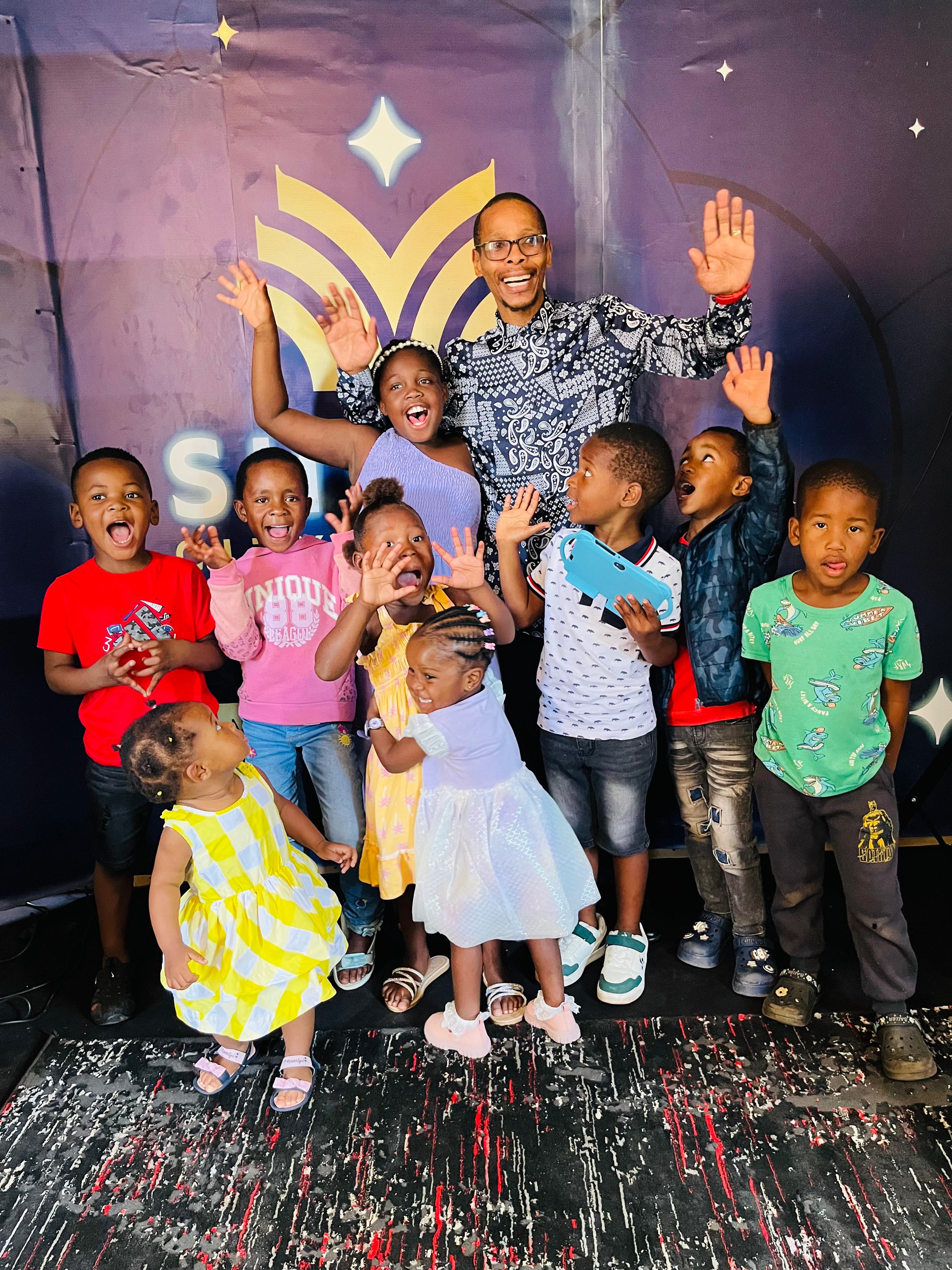 Pastor Masixole with children